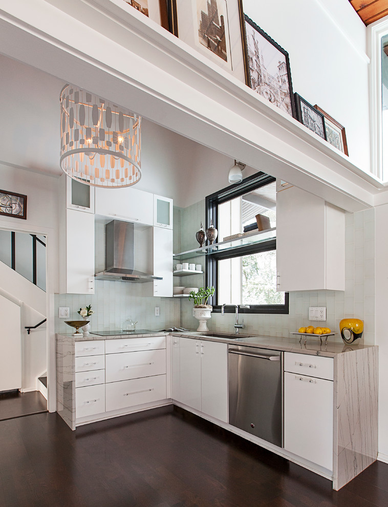 This is an example of a small contemporary l-shaped kitchen/diner in Birmingham with a submerged sink, flat-panel cabinets, white cabinets, stainless steel appliances, dark hardwood flooring and no island.