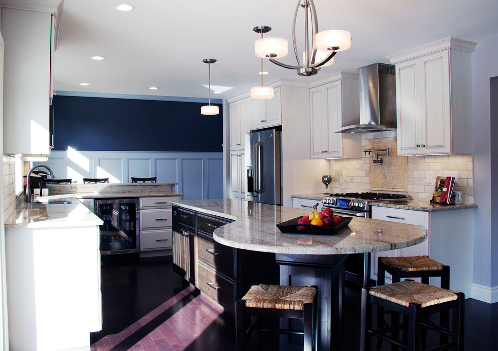 Inspiration for a contemporary dark wood floor eat-in kitchen remodel in Detroit with an undermount sink, raised-panel cabinets, white cabinets, granite countertops, black backsplash, ceramic backsplash, white appliances and an island