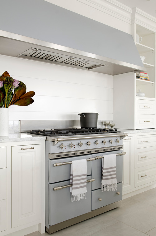 Canadian kitchen with white RTA cabinets and premium range stove showing custom-like design