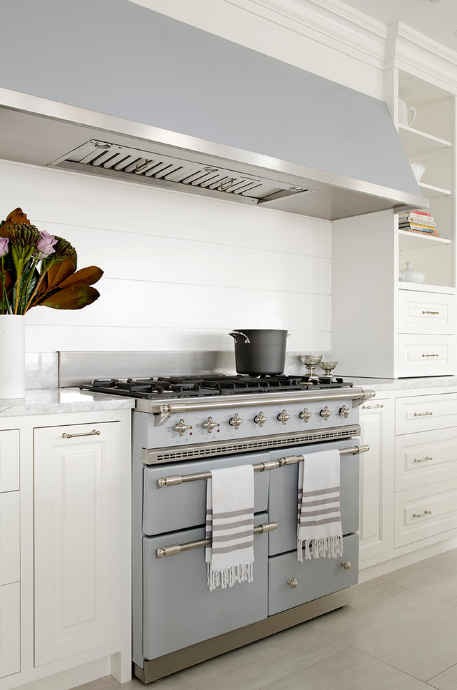 Beach style kitchen photo in New York with colored appliances