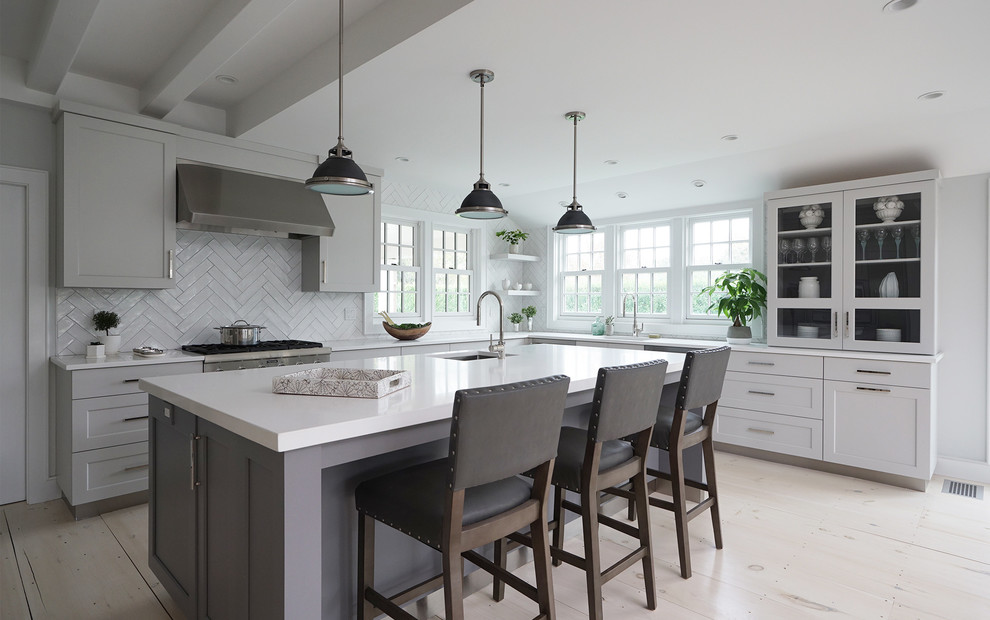 Inspiration for a transitional light wood floor and white floor kitchen remodel with an undermount sink, beaded inset cabinets, white cabinets, quartz countertops, white backsplash, ceramic backsplash, stainless steel appliances, an island and white countertops