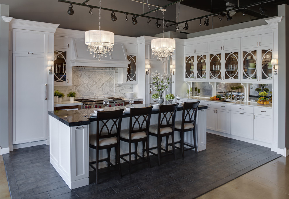 Inspiration for a timeless kitchen remodel in Other with glass-front cabinets and marble countertops