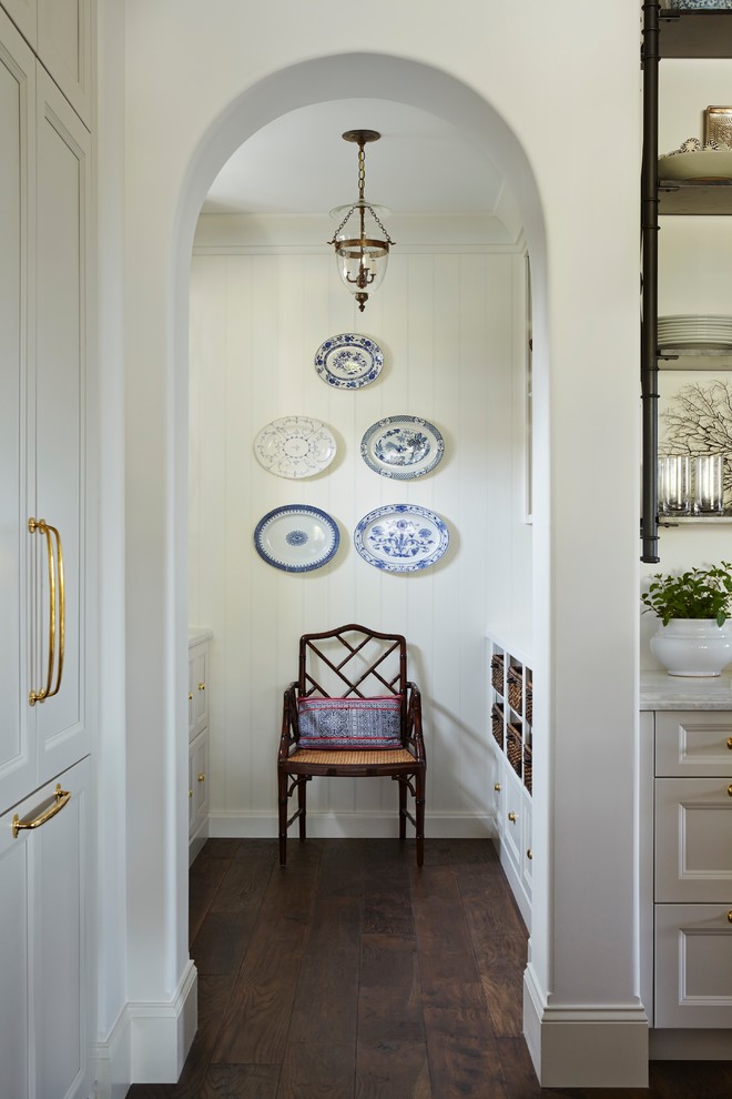 Inspiration for a large coastal galley dark wood floor kitchen pantry remodel in Miami with shaker cabinets, white cabinets, marble countertops, white backsplash, wood backsplash, paneled appliances and no island