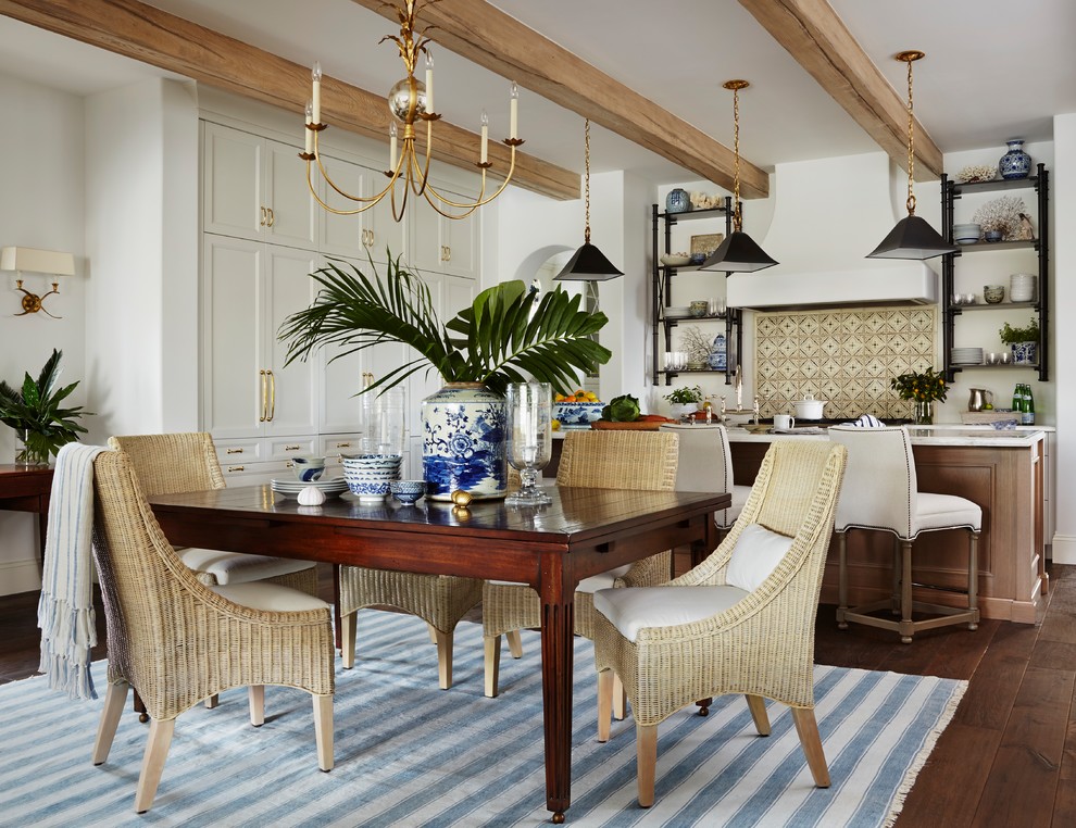 Eat-in kitchen - large traditional single-wall dark wood floor eat-in kitchen idea in Miami with an undermount sink, shaker cabinets, white cabinets, marble countertops, white backsplash, cement tile backsplash, paneled appliances and an island