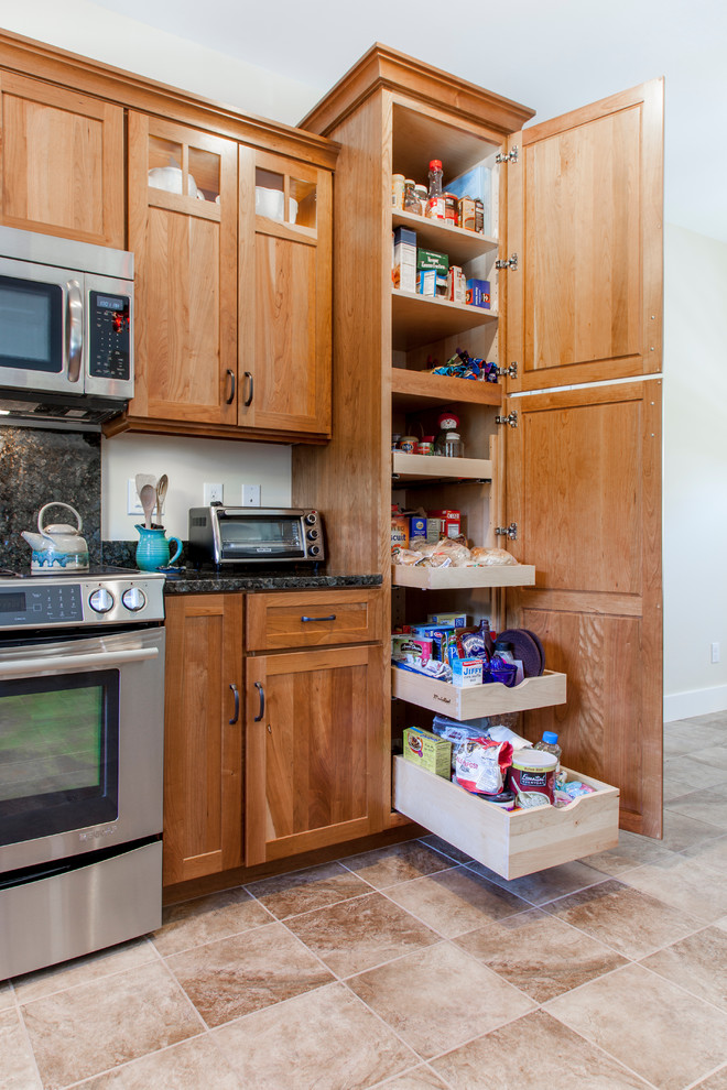 Natural Cherry Shaker kitchen with dark granite countertops ...