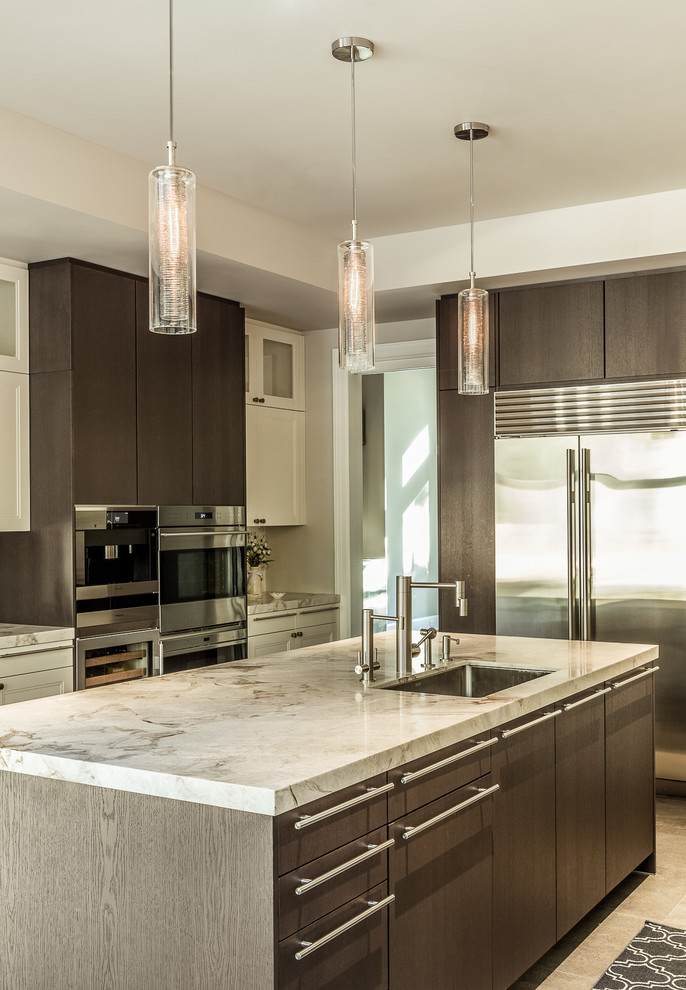 Example of a minimalist u-shaped porcelain tile enclosed kitchen design in New York with a single-bowl sink, flat-panel cabinets, dark wood cabinets, quartzite countertops, multicolored backsplash, mosaic tile backsplash, stainless steel appliances and an island