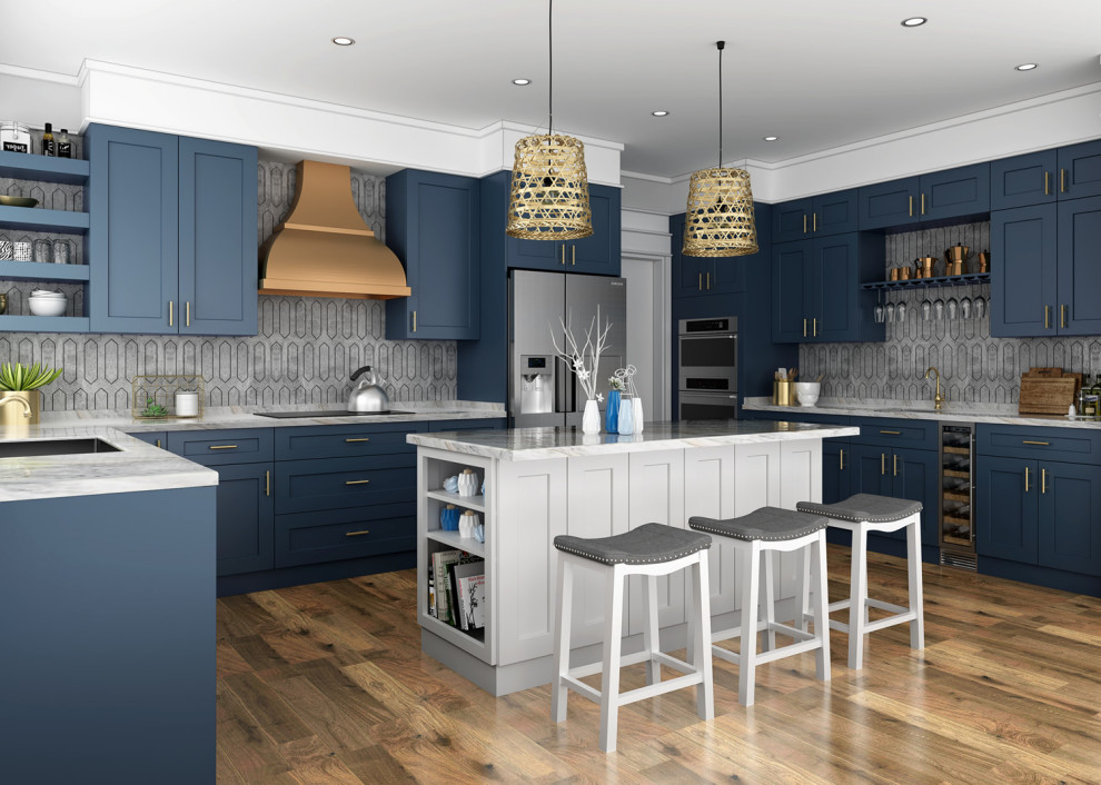 Medium sized contemporary u-shaped kitchen/diner in Philadelphia with a submerged sink, shaker cabinets, blue cabinets, granite worktops, grey splashback, ceramic splashback, stainless steel appliances, light hardwood flooring, an island, brown floors and white worktops.