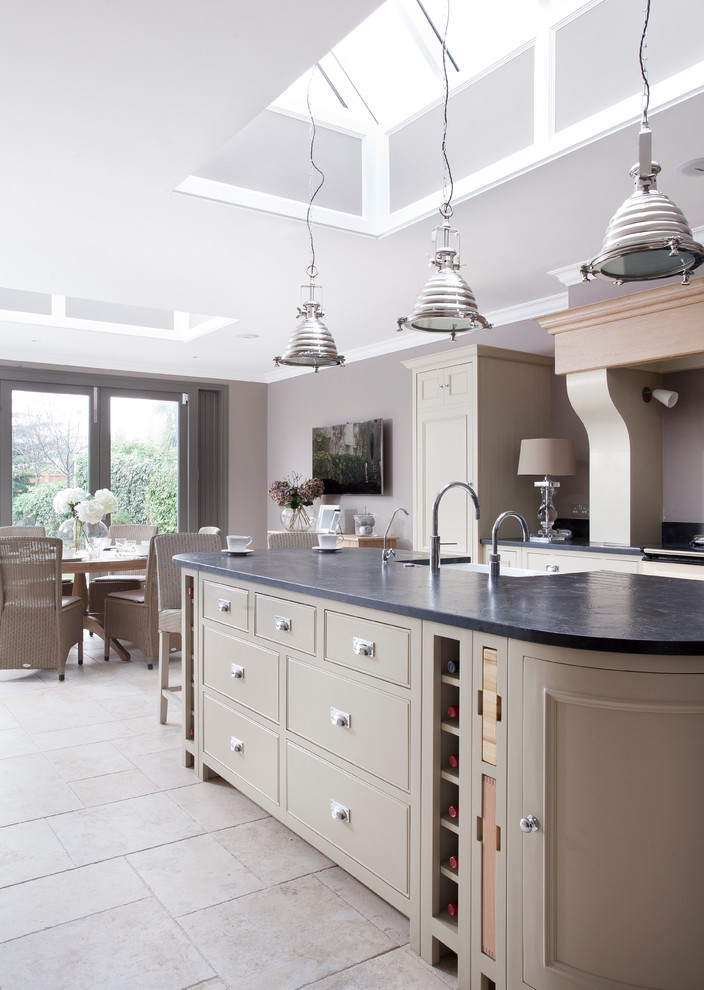 Example of a transitional kitchen design in Dublin