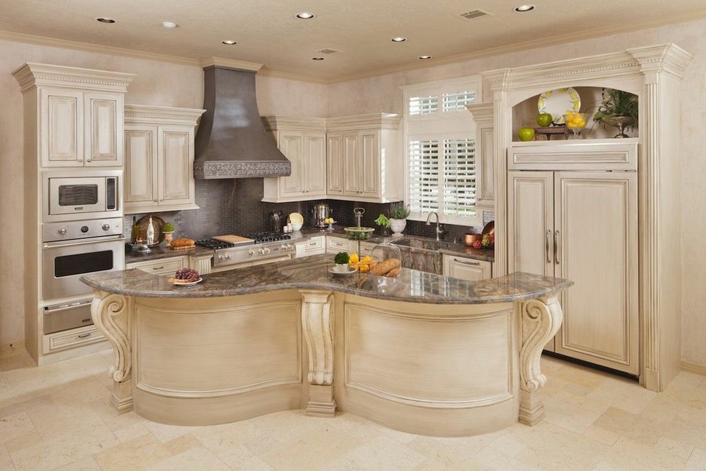 Inspiration for a timeless l-shaped eat-in kitchen remodel in Houston with an integrated sink, beige cabinets, metallic backsplash, metal backsplash and stainless steel appliances