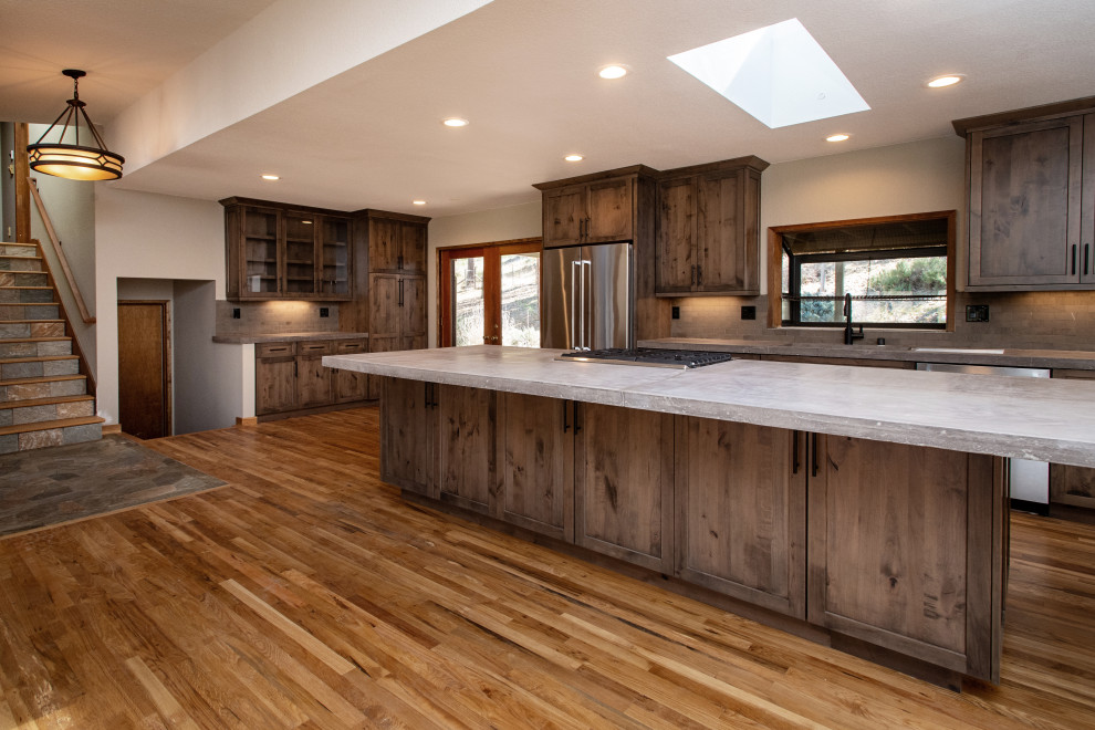 Large rustic galley open plan kitchen in Sacramento.