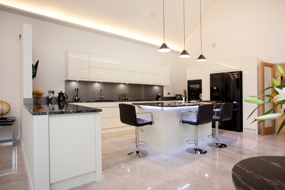 Inspiration for a contemporary open plan kitchen in Other with white cabinets and an island.