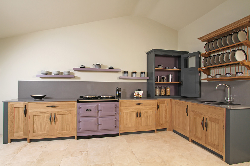 Trendy kitchen photo in Hampshire with shaker cabinets and colored appliances