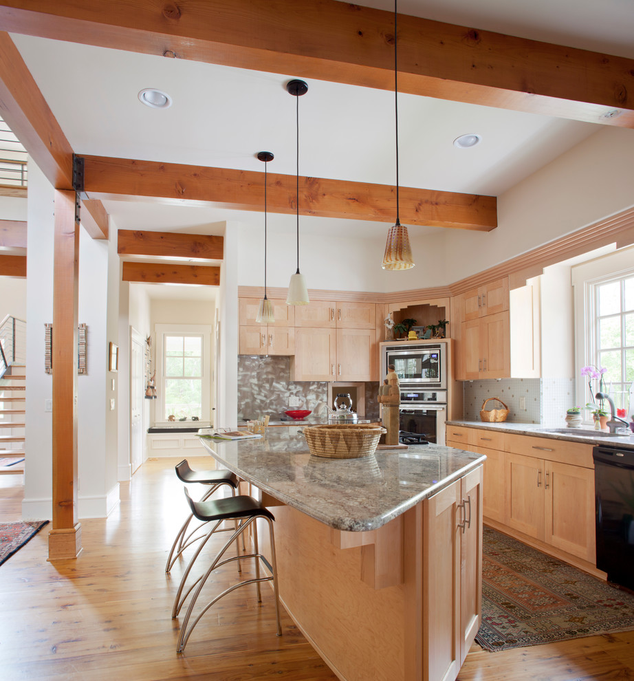 Photo of a contemporary kitchen in Boston with light wood cabinets.
