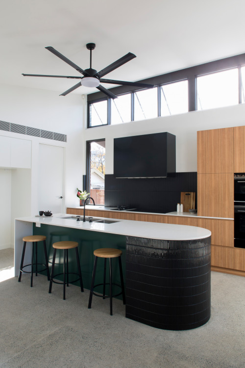 Green and Black Kitchen Island Design with White Countertop