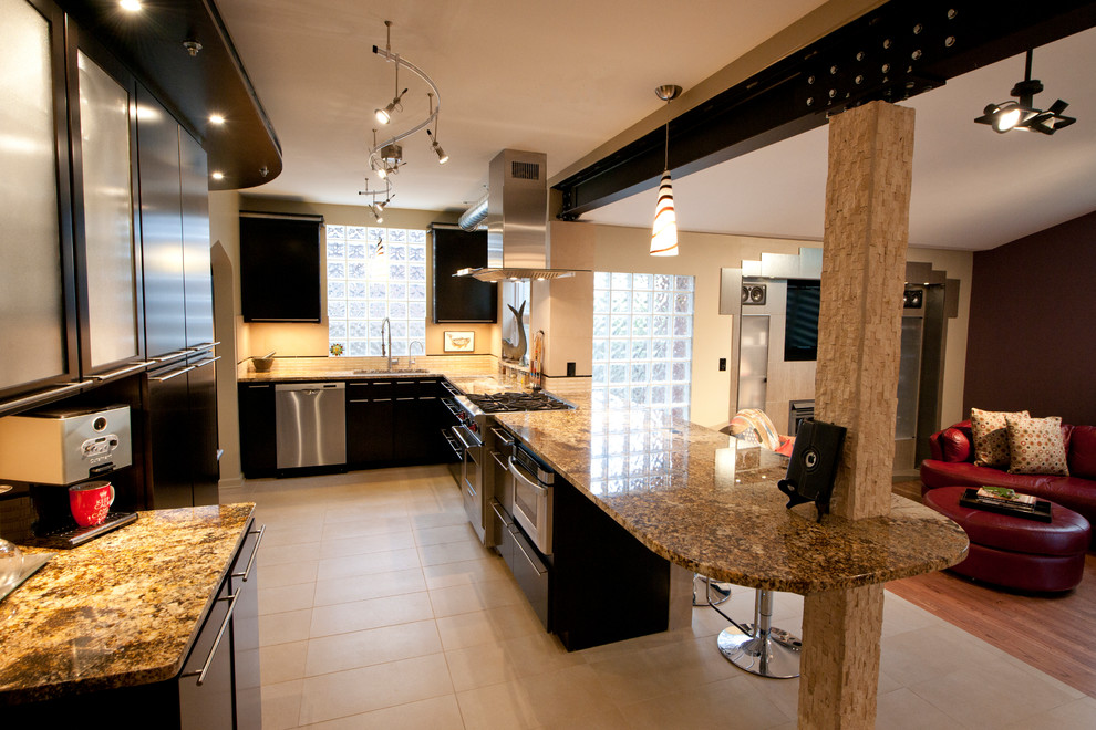 Example of a mid-sized eclectic galley porcelain tile kitchen design in Indianapolis with a single-bowl sink, flat-panel cabinets, black cabinets, granite countertops, beige backsplash, porcelain backsplash and stainless steel appliances