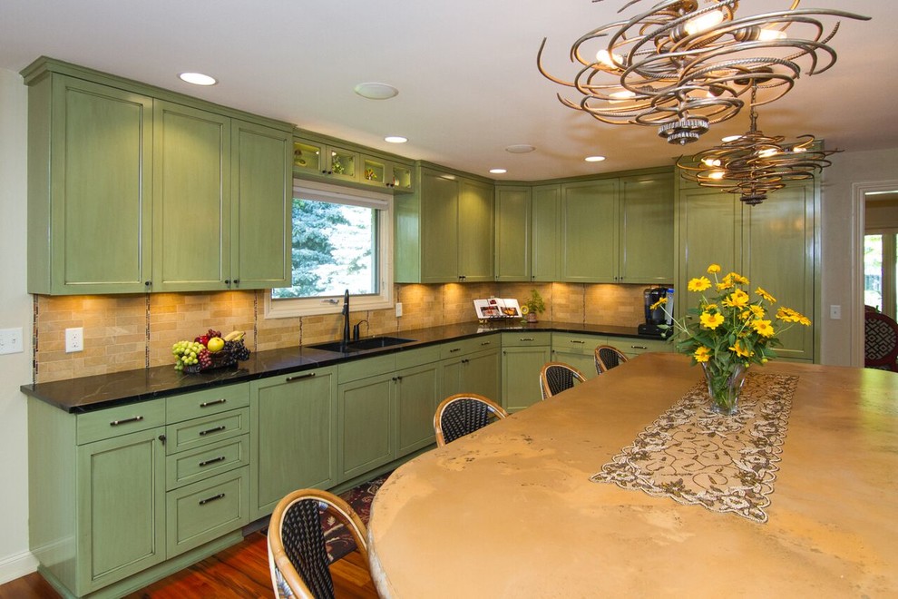 Large elegant u-shaped medium tone wood floor eat-in kitchen photo in Minneapolis with green cabinets, stainless steel appliances, an island, an undermount sink, recessed-panel cabinets, soapstone countertops, beige backsplash and ceramic backsplash