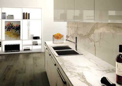 Sleek galley kitchen with glossy backsplash and sink — inspiration for Scratch-Resistant Melamine cabinetry