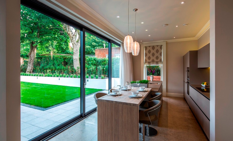 Inspiration for a medium sized contemporary single-wall kitchen in London with a submerged sink, brown cabinets, integrated appliances and an island.