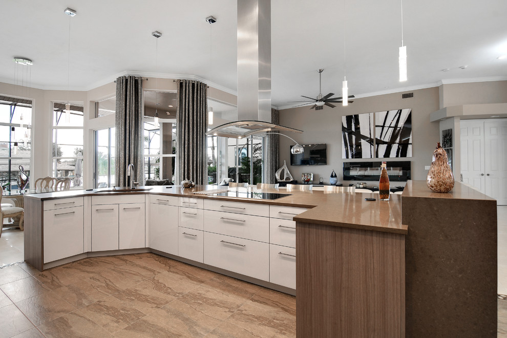 Mid-sized trendy l-shaped ceramic tile eat-in kitchen photo in Orlando with an undermount sink, flat-panel cabinets, medium tone wood cabinets, quartz countertops, brown backsplash, paneled appliances and an island