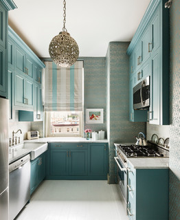 Premium AI Image  Turquoise kitchen cabinets with a wooden countertop and  a white stove.