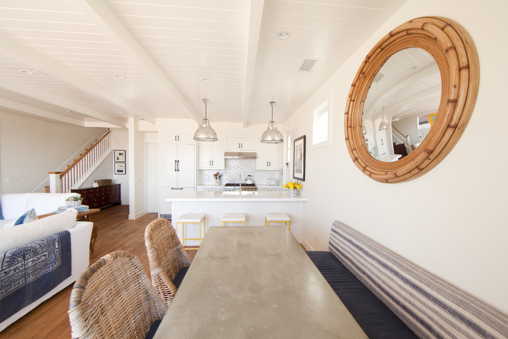 Photo of a coastal dining room in Orange County.