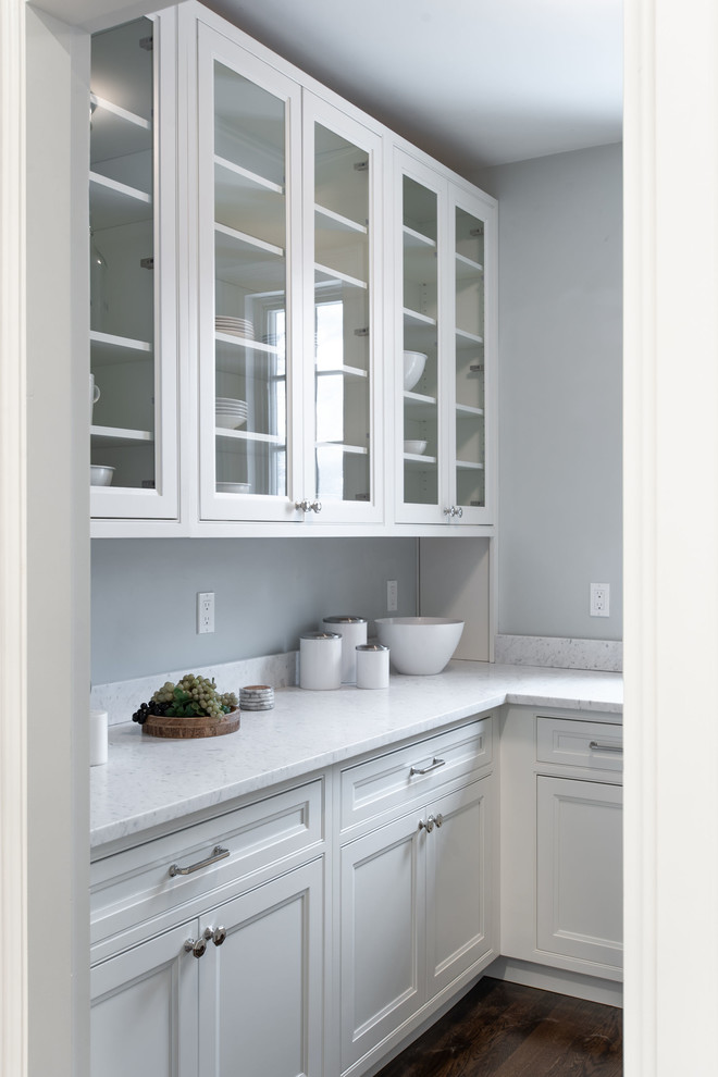 Eat-in kitchen - huge traditional l-shaped dark wood floor and brown floor eat-in kitchen idea in Boston with an undermount sink, beaded inset cabinets, white cabinets, marble countertops, gray backsplash, marble backsplash, stainless steel appliances, an island and white countertops