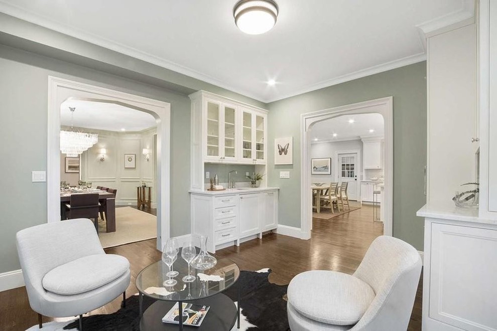 Huge elegant l-shaped dark wood floor and brown floor eat-in kitchen photo in Boston with an undermount sink, beaded inset cabinets, white cabinets, marble countertops, gray backsplash, marble backsplash, stainless steel appliances, an island and white countertops
