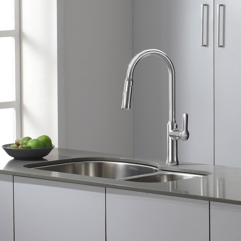 Example of a minimalist kitchen design in New York with a double-bowl sink