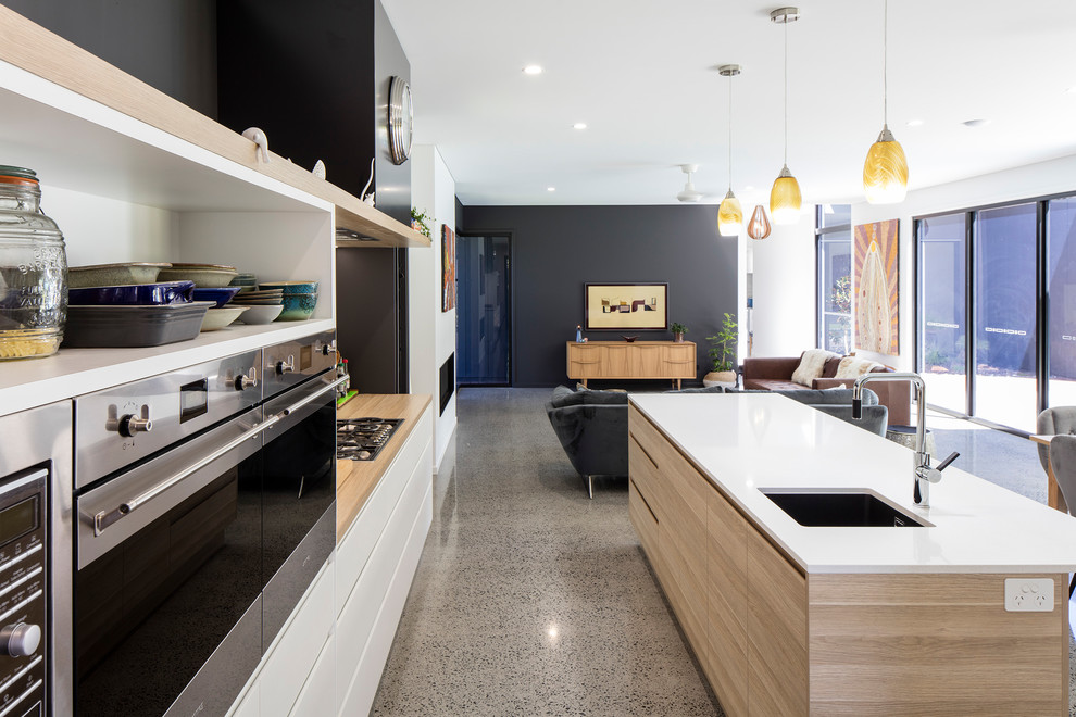Photo of a medium sized modern galley kitchen in Sunshine Coast.