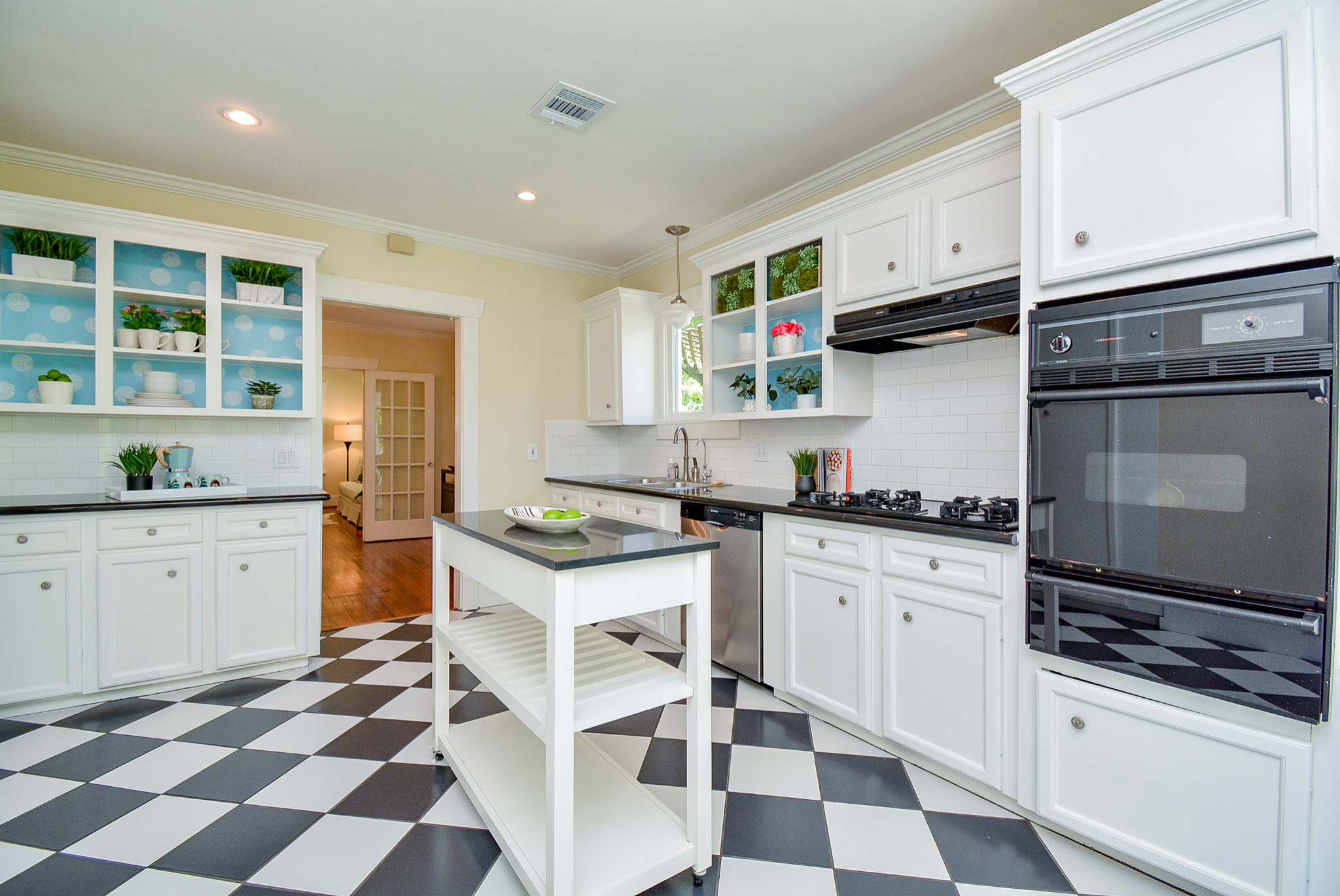 Black & white kitchen  Checkered kitchen decor, Black kitchen