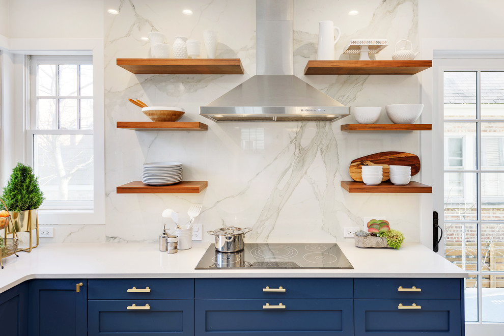 Inspiration for a large transitional l-shaped porcelain tile and white floor enclosed kitchen remodel in Chicago with a farmhouse sink, shaker cabinets, blue cabinets, quartzite countertops, white backsplash, marble backsplash, paneled appliances and an island