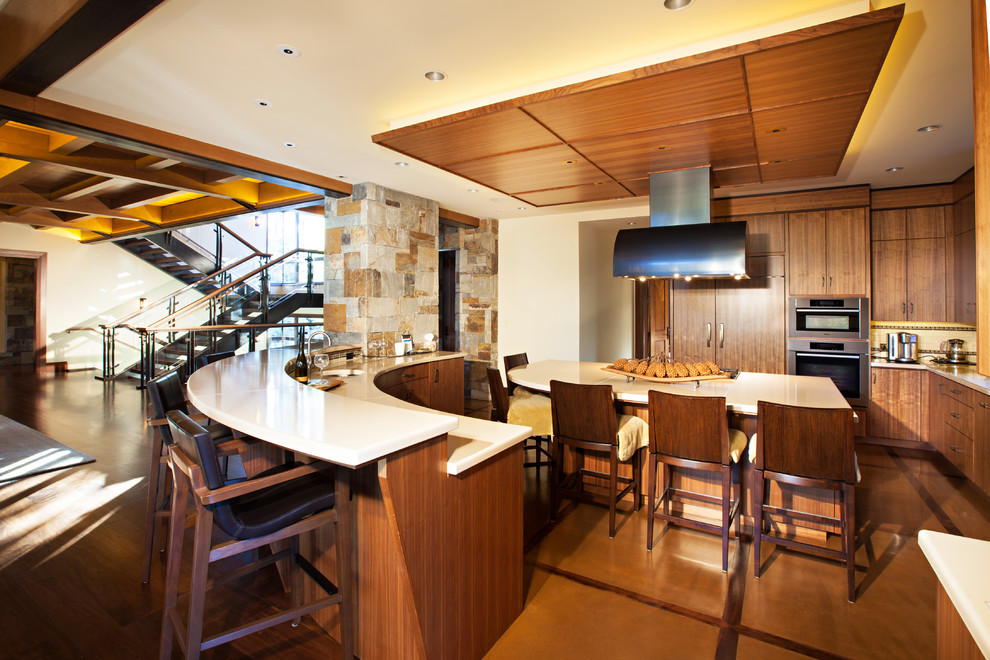 Rustikale Küche mit flächenbündigen Schrankfronten, dunklen Holzschränken und Küchengeräten aus Edelstahl in San Francisco