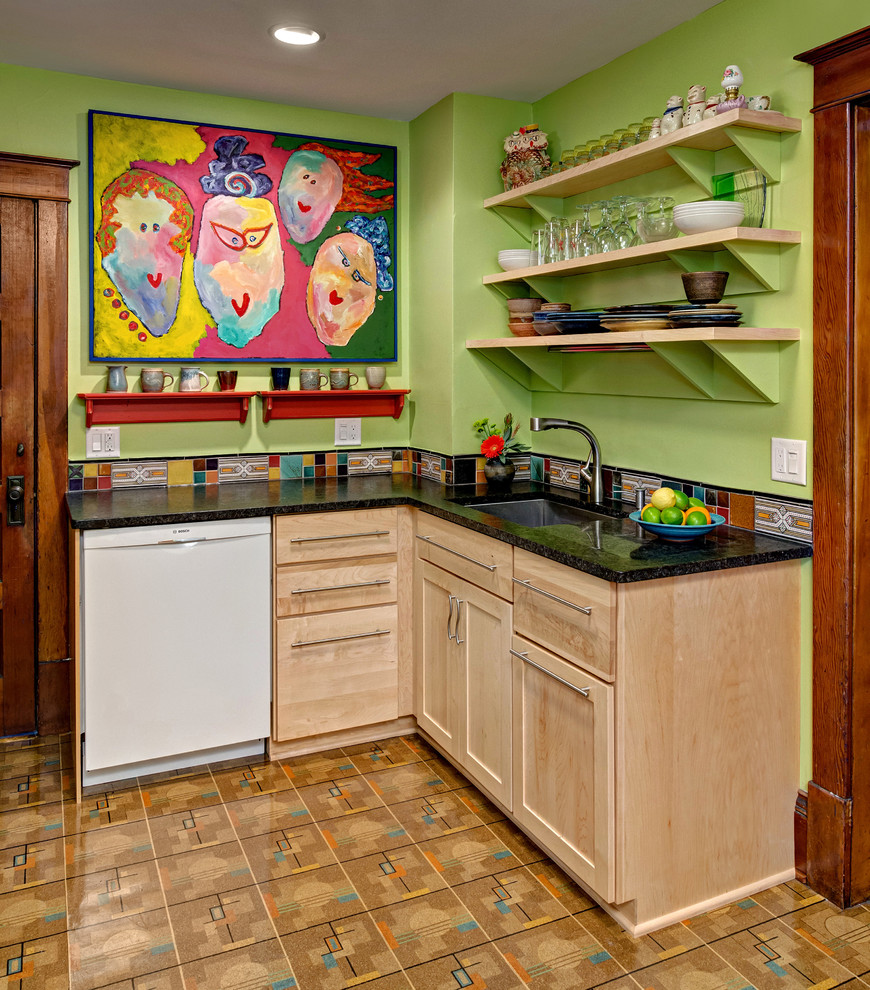Small eclectic u-shaped kitchen/diner in Minneapolis with light wood cabinets, multi-coloured splashback, white appliances, a submerged sink, recessed-panel cabinets, engineered stone countertops, ceramic splashback, light hardwood flooring and no island.