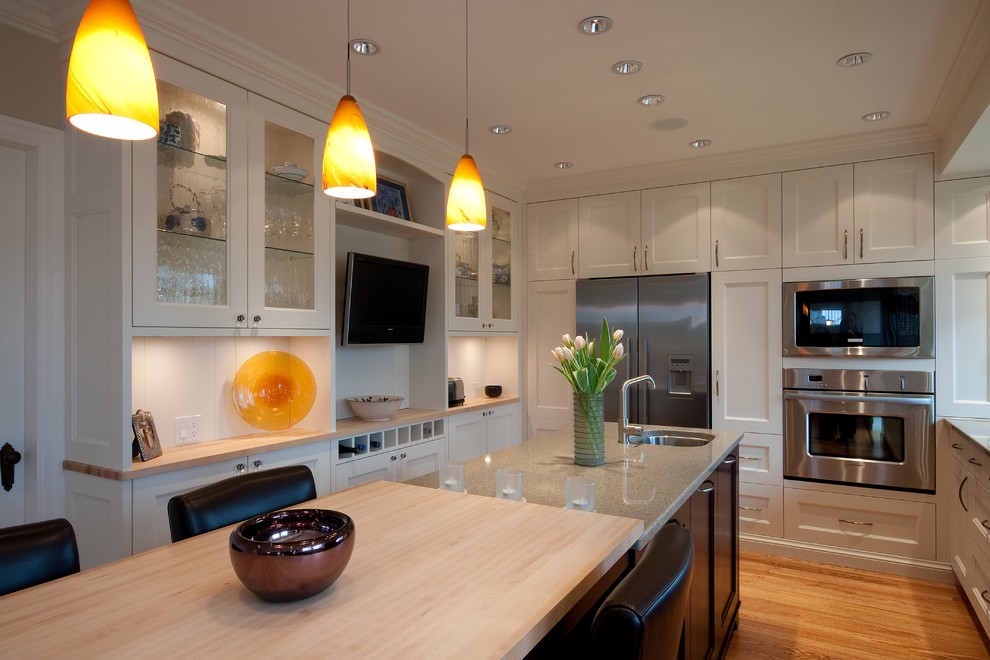 Inspiration for a traditional kitchen in Vancouver with stainless steel appliances.
