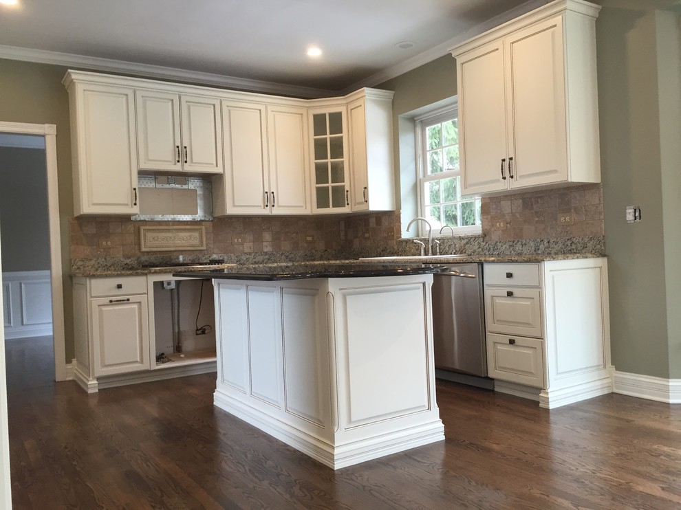 Oak Cabinets refinished to traditional white with Glaze - Traditional - Kitchen