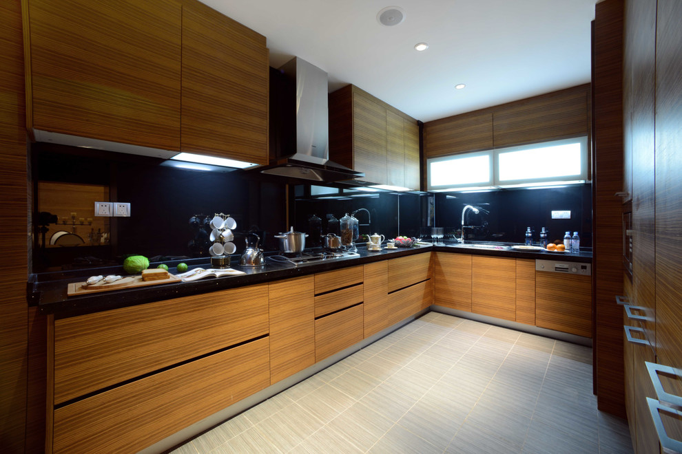 This is an example of a medium sized modern u-shaped kitchen/diner in Other with a double-bowl sink, flat-panel cabinets, yellow cabinets, engineered stone countertops, black splashback, ceramic splashback, stainless steel appliances, ceramic flooring and no island.