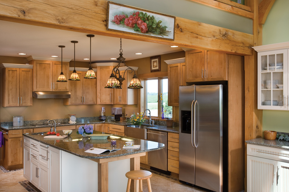 Bild på ett mellanstort lantligt l-kök, med skåp i mellenmörkt trä, rostfria vitvaror, en köksö, klinkergolv i keramik, skåp i shakerstil och granitbänkskiva