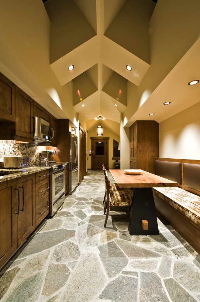 Inspiration for a rustic kitchen remodel in Vancouver with stainless steel appliances