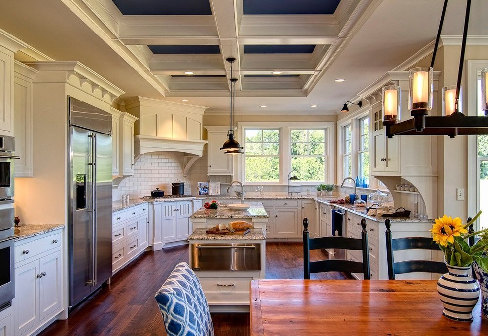 Inspiration for a contemporary kitchen with dark hardwood flooring.
