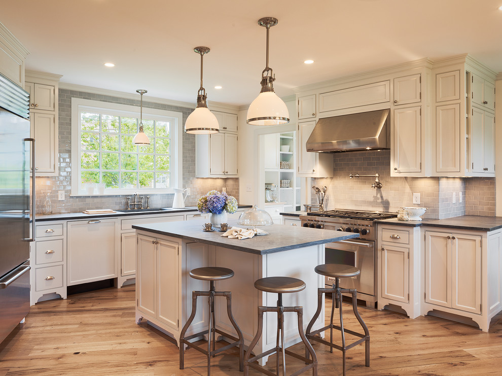 Design ideas for a classic grey and cream kitchen in Boston with stainless steel appliances.