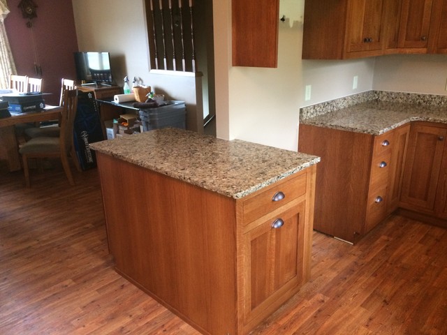 https://st.hzcdn.com/simgs/pictures/kitchens/omega-cabinetry-plainfield-inset-door-quartersawn-oak-wood-nutmeg-stain-herman-s-kitchen-and-bath-design-img~baa106f30ab3ef34_4-0079-1-8770e5c.jpg