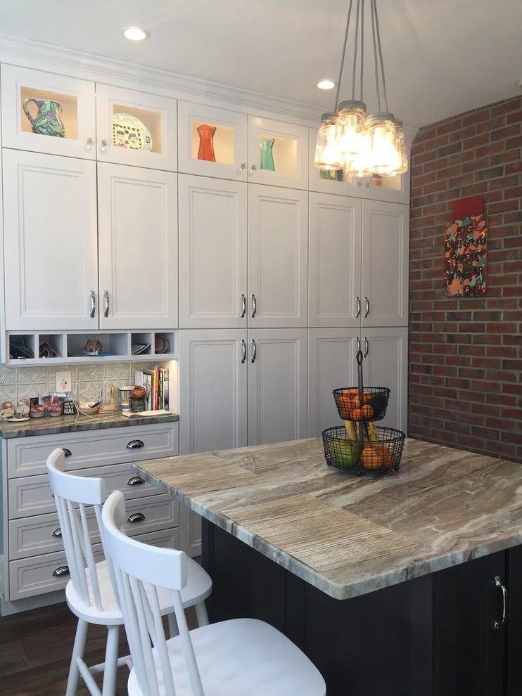 Example of a mid-sized country u-shaped ceramic tile eat-in kitchen design in Boston with a farmhouse sink, shaker cabinets, white cabinets, quartzite countertops, metallic backsplash, metal backsplash, stainless steel appliances and two islands