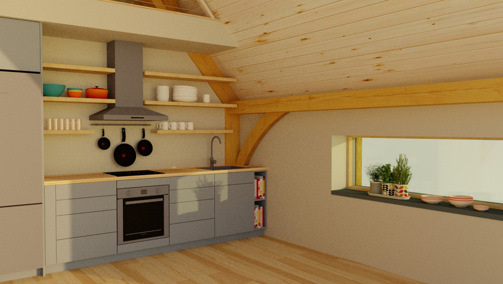 Idéer för ett litet lantligt linjärt kök och matrum, med en enkel diskho, släta luckor, träbänkskiva, vitt stänkskydd, rostfria vitvaror och ljust trägolv