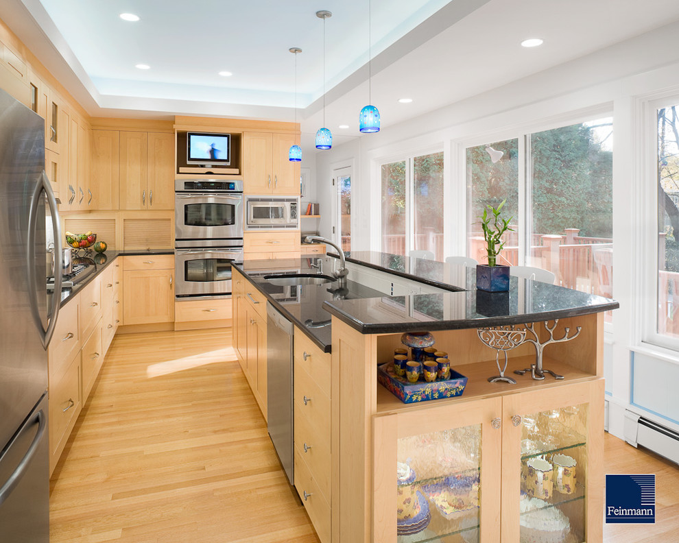 Contemporary kitchen in Boston with stainless steel appliances.