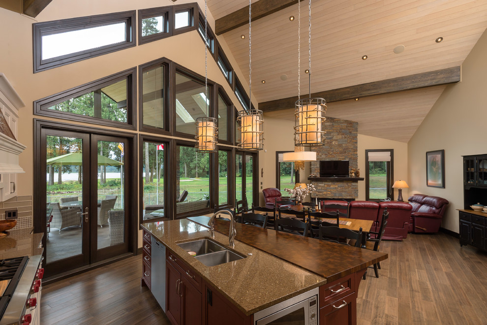 Open Concept Family Room With Vaulted Ceilings Rustic Kitchen