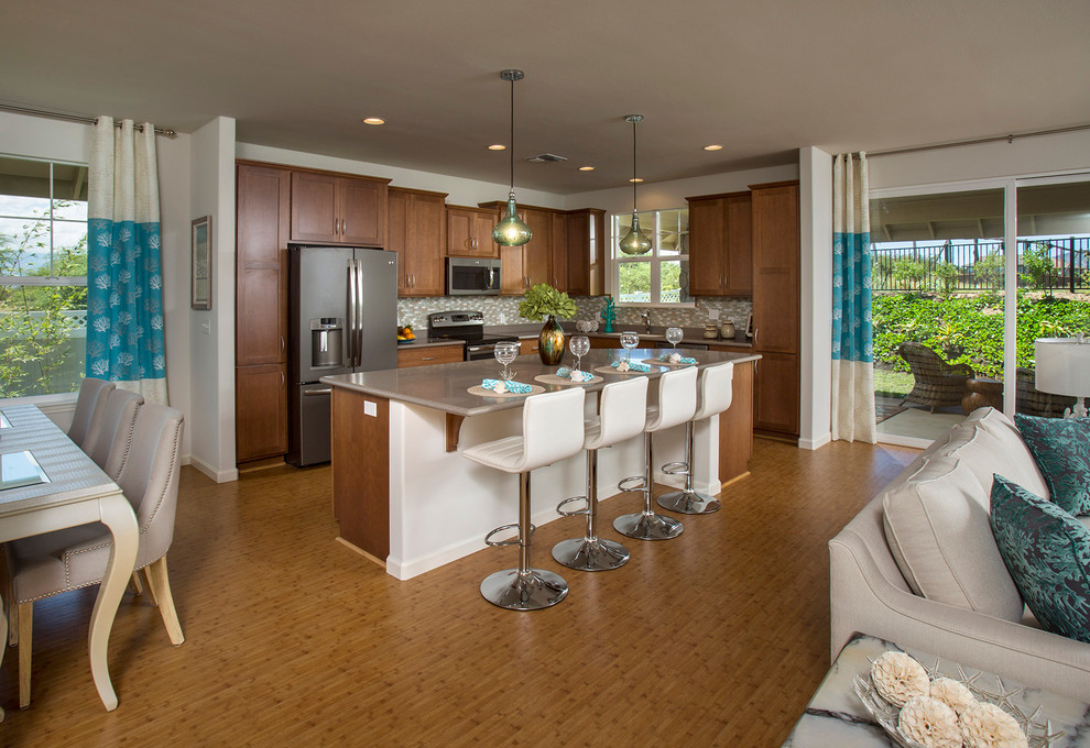 Eat-in kitchen - small contemporary l-shaped bamboo floor eat-in kitchen idea in Hawaii with medium tone wood cabinets, laminate countertops, multicolored backsplash, stainless steel appliances, an island and shaker cabinets
