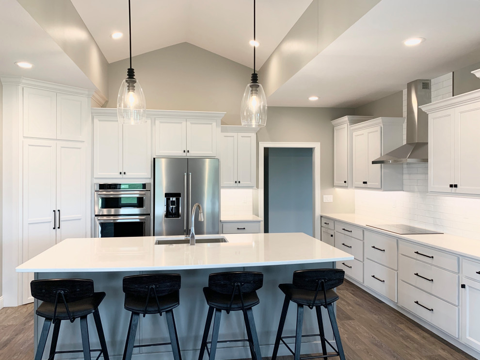 Open Concept Kitchen With Large Island in New Build by Hazelwood Homes