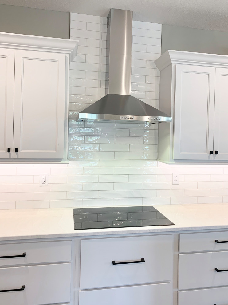 Open Concept Kitchen With Large Island in New Build by Hazelwood Homes