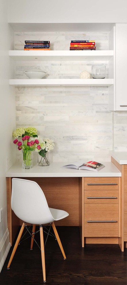 Kitchen - contemporary kitchen idea in Toronto with flat-panel cabinets, medium tone wood cabinets and white backsplash