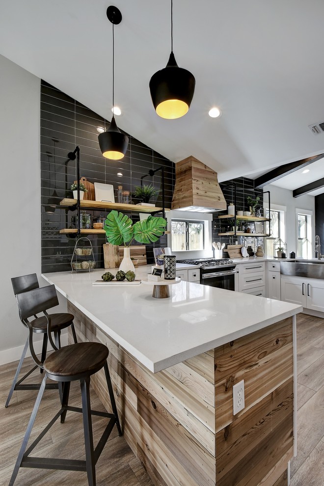 Example of a mid-sized trendy kitchen design in Austin